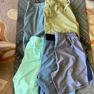 Five shorts - 2 pacsun and three Nike - size med